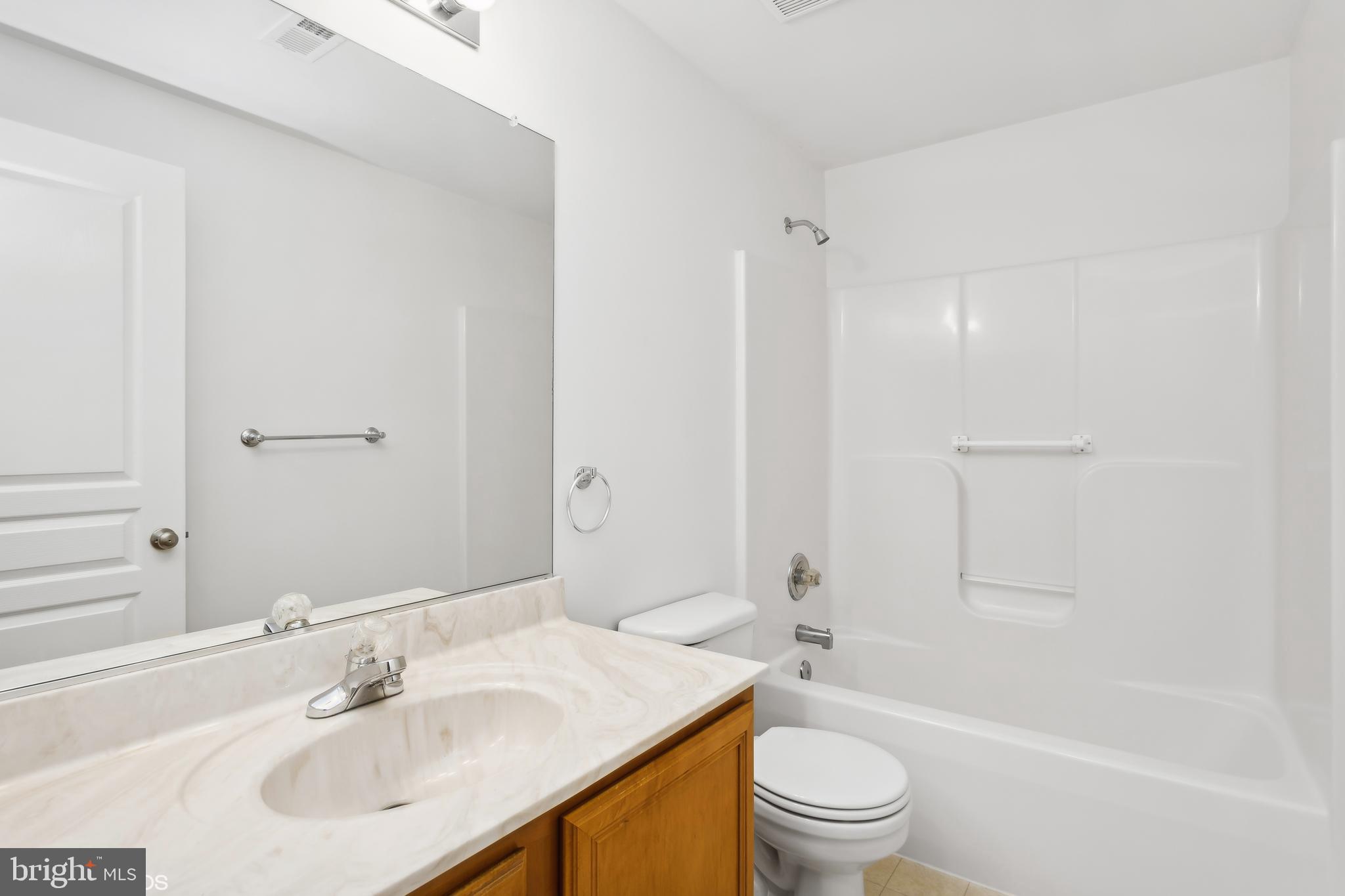 818 Hoods Mill Road Cooksville, MD 21723 - Photo 90 of 108 a bathroom with a sink a toilet and shower