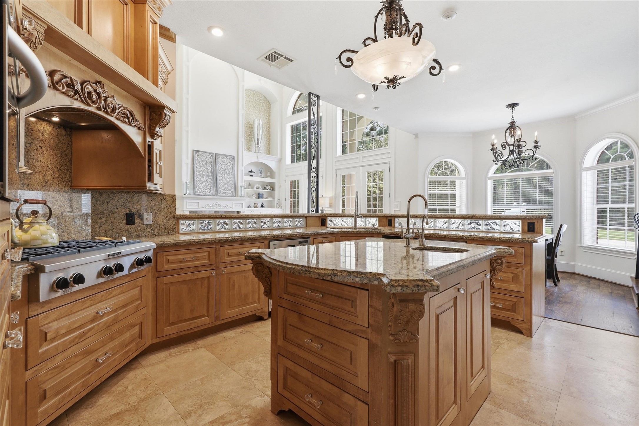 8582 Highway 75 Huntsville, TX 77340 - Photo 13 of 50 a kitchen with stainless steel appliances granite countertop a sink a stove and a refrigerator