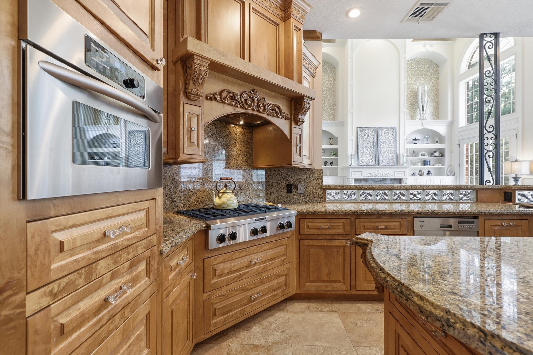 8582 Highway 75 Huntsville, TX 77340 - Photo 15 of 50 a kitchen with stainless steel appliances granite countertop a stove and a sink
