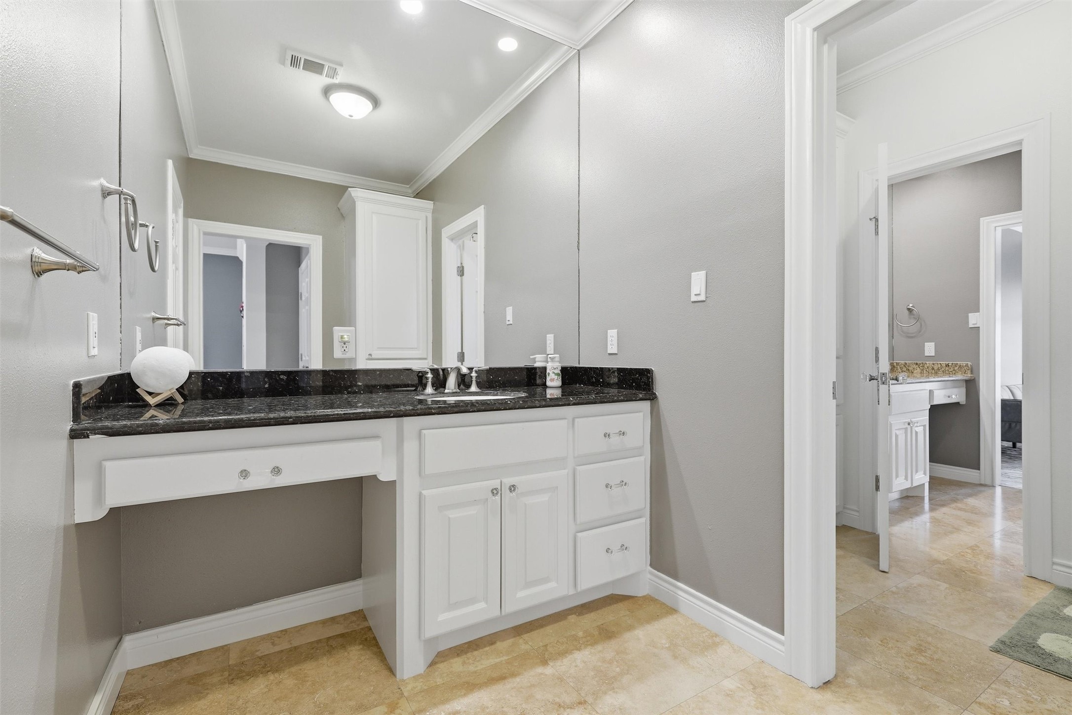8582 Highway 75 Huntsville, TX 77340 - Photo 32 of 50 a bathroom with a sink and a mirror