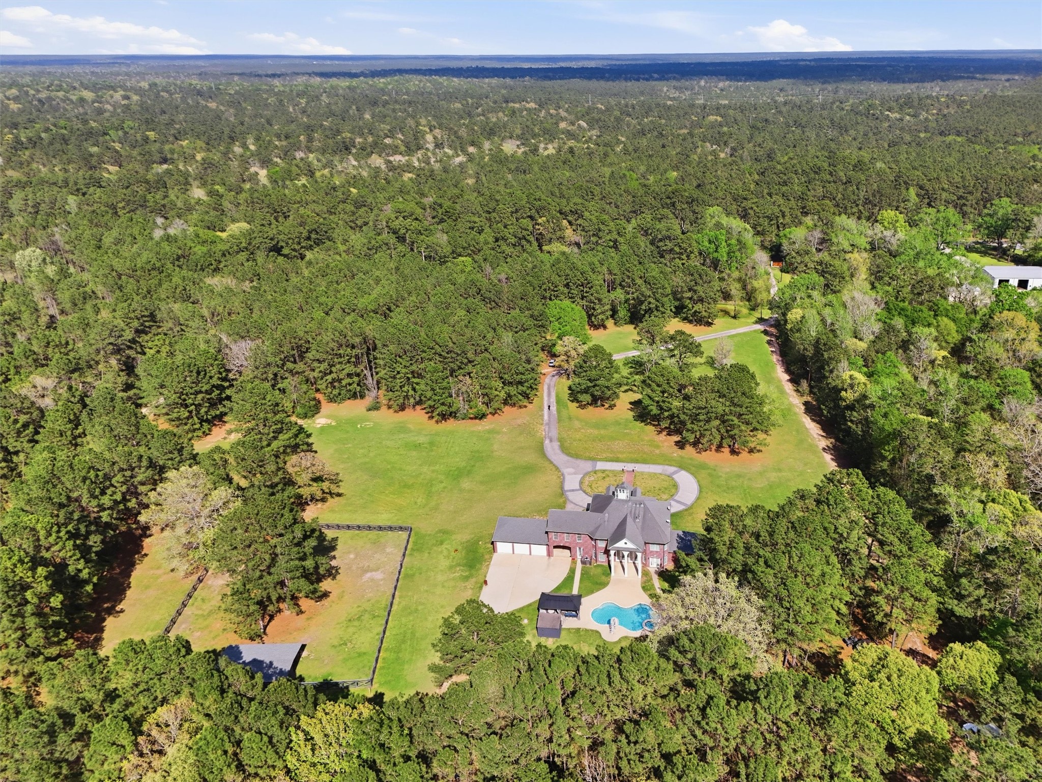8582 Highway 75 Huntsville, TX 77340 - Photo 49 of 50 a view of a lake with a yard