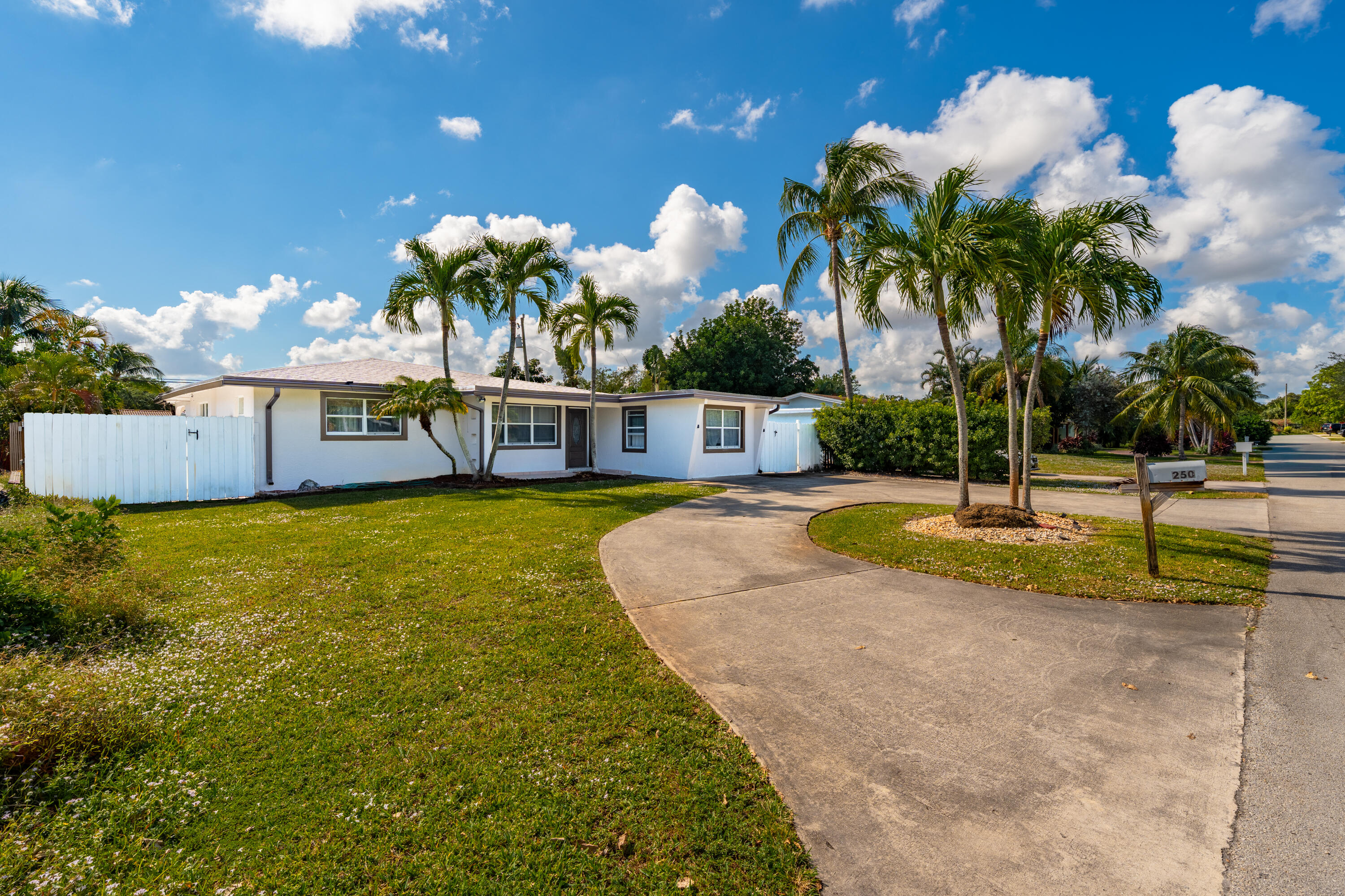 250 Northwest 11th Street Boca Raton, FL 33432 - Photo 2 of 30 a view of a swimming pool with a patio