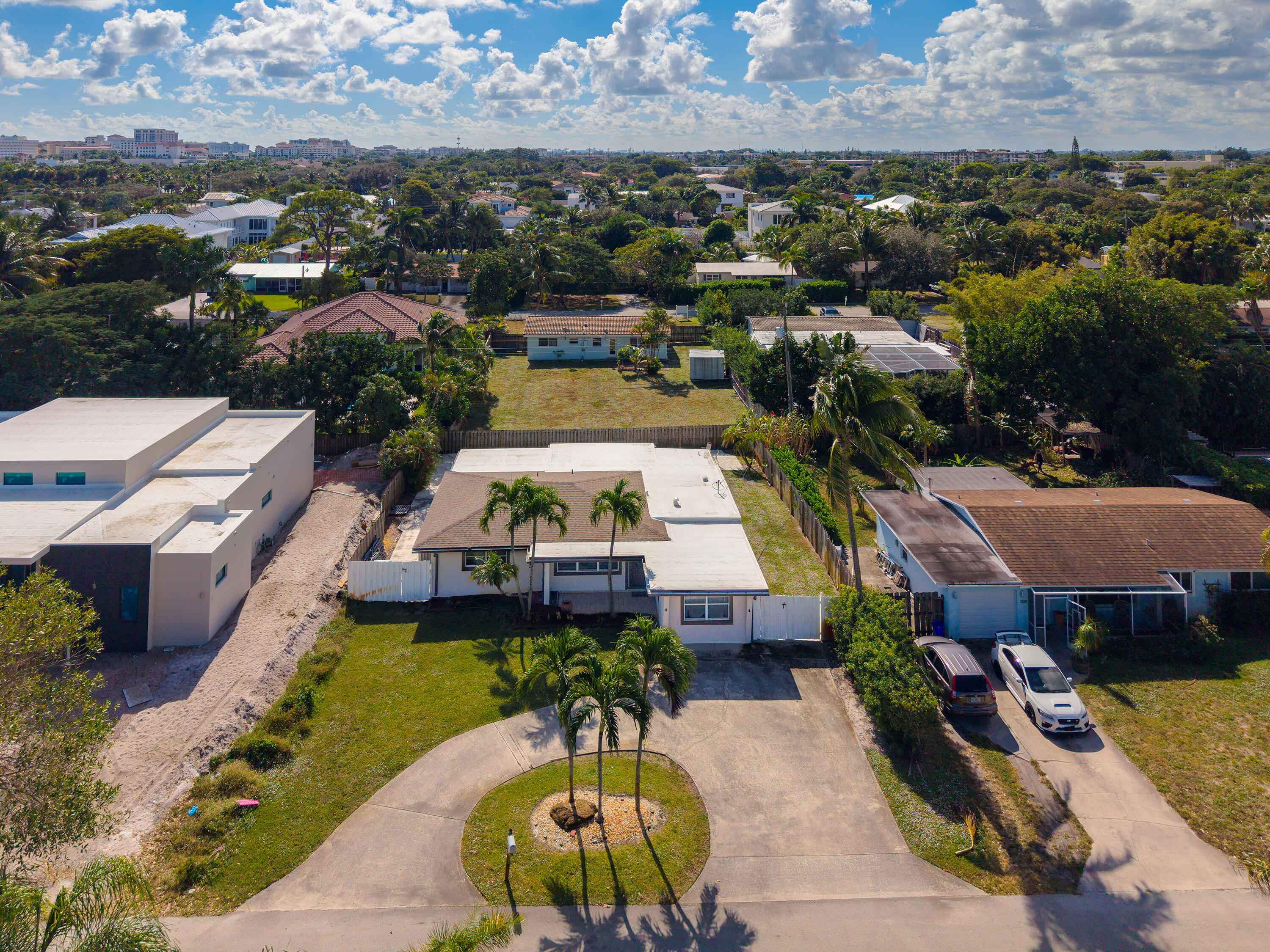 250 Northwest 11th Street Boca Raton, FL 33432 - Photo 25 of 30 an aerial view of a house with swimming pool and lake view
