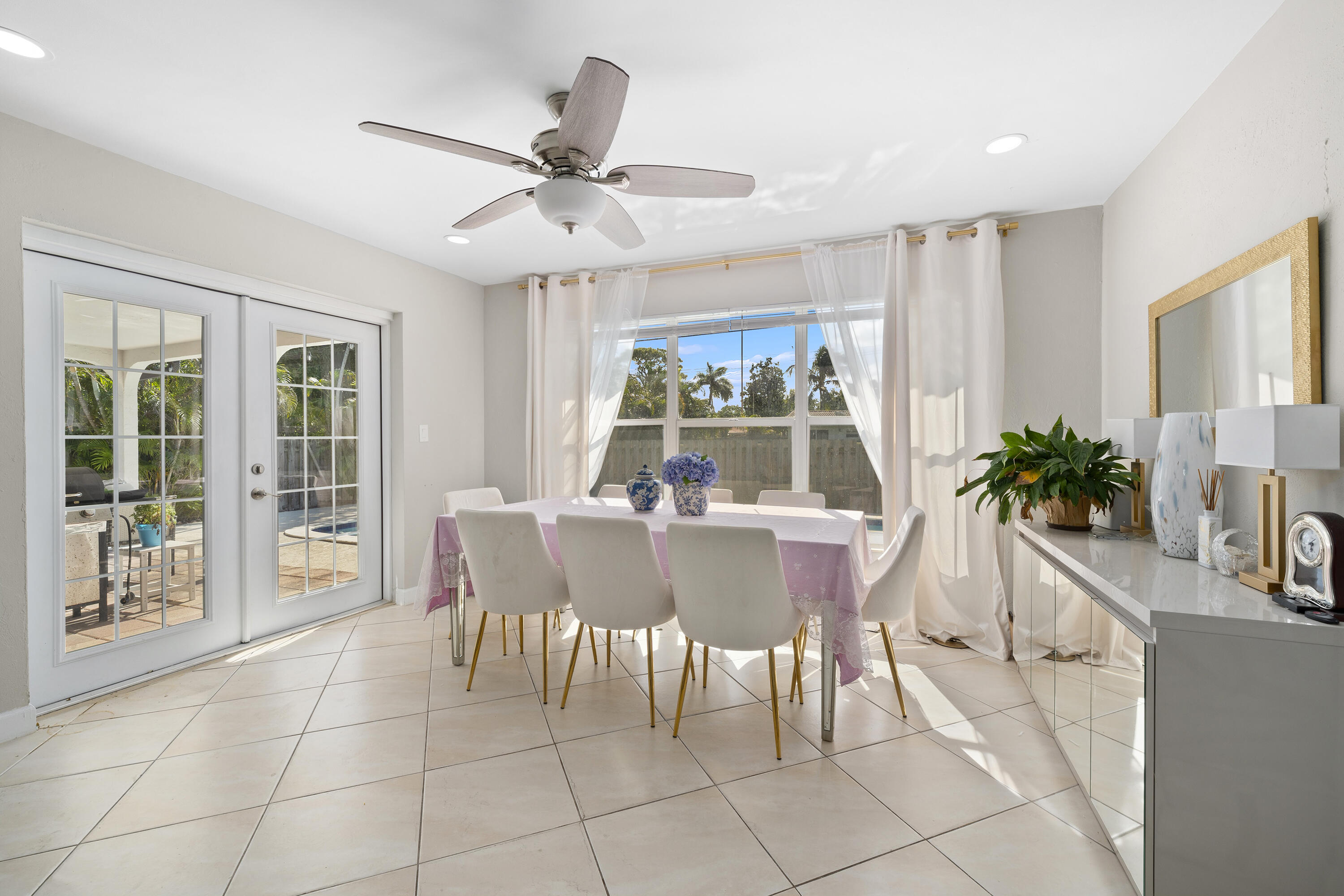 250 Northwest 11th Street Boca Raton, FL 33432 - Photo 6 of 30 a dining room with furniture window and wooden floor