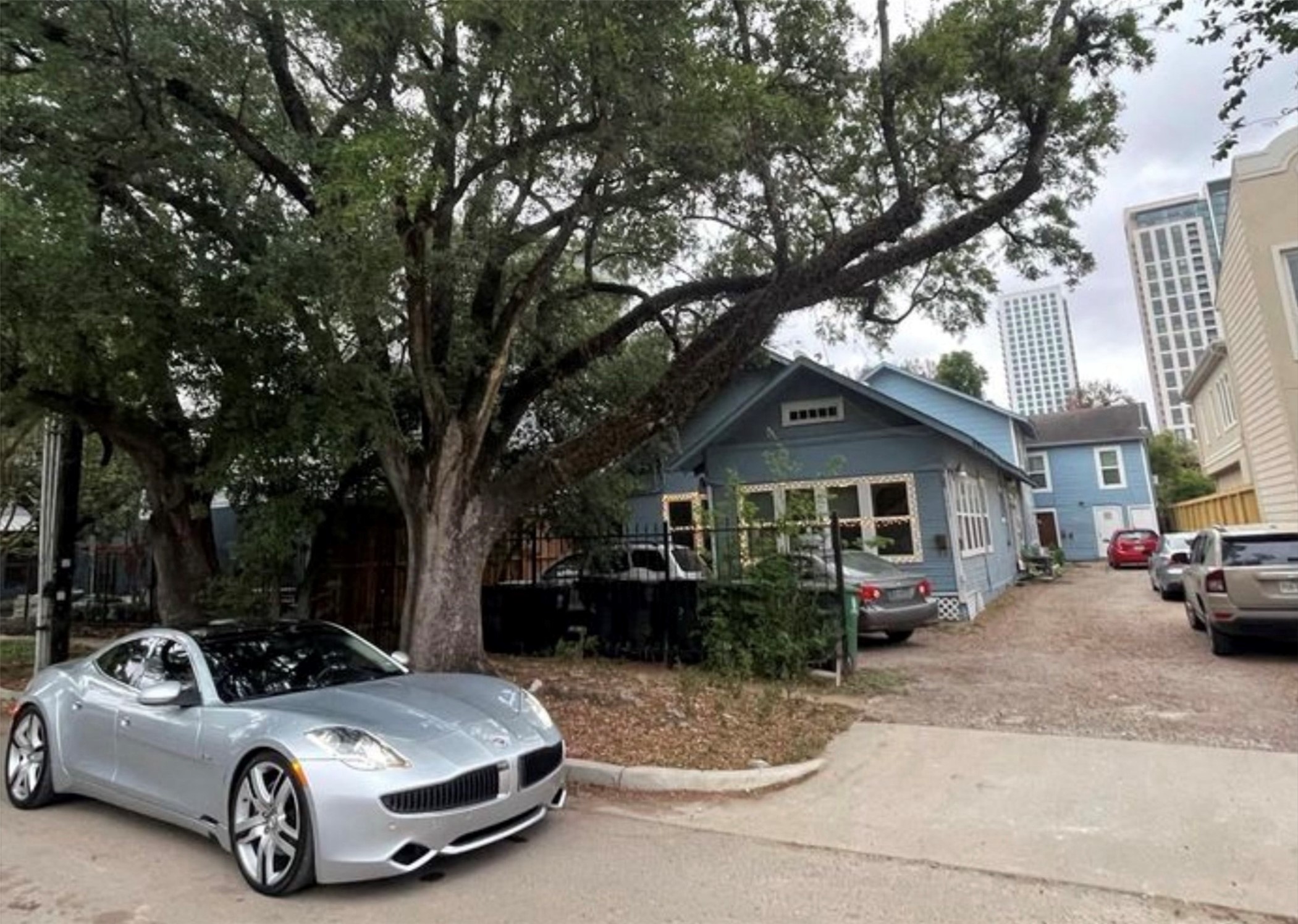 a car parked in front of a house