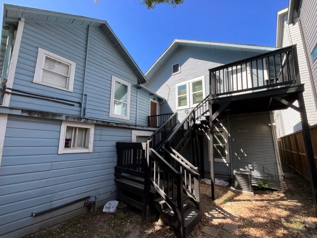 3403 Yupon Street Houston, TX 77006 - Photo 2 of 29 a view of a house with iron stairs
