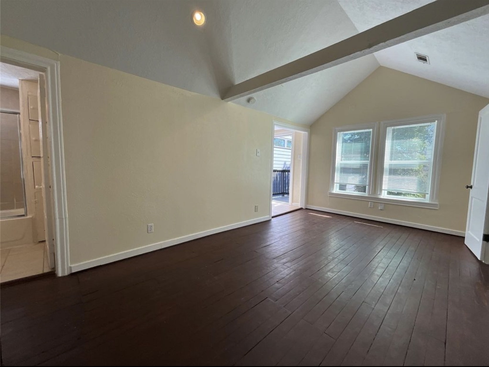 3403 Yupon Street Houston, TX 77006 - Photo 25 of 29 an empty room with wooden floor and windows