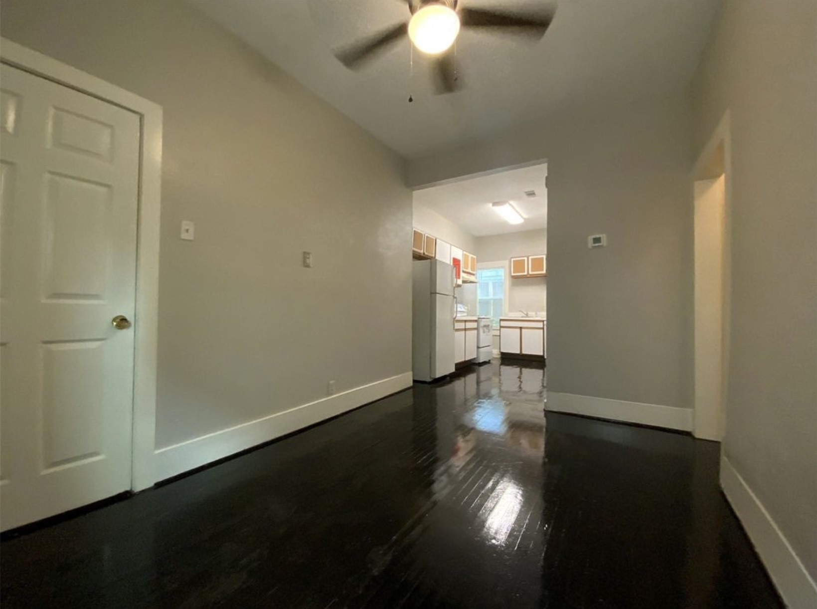 3403 Yupon Street Houston, TX 77006 - Photo 27 of 29 wooden floor in an empty room with a window