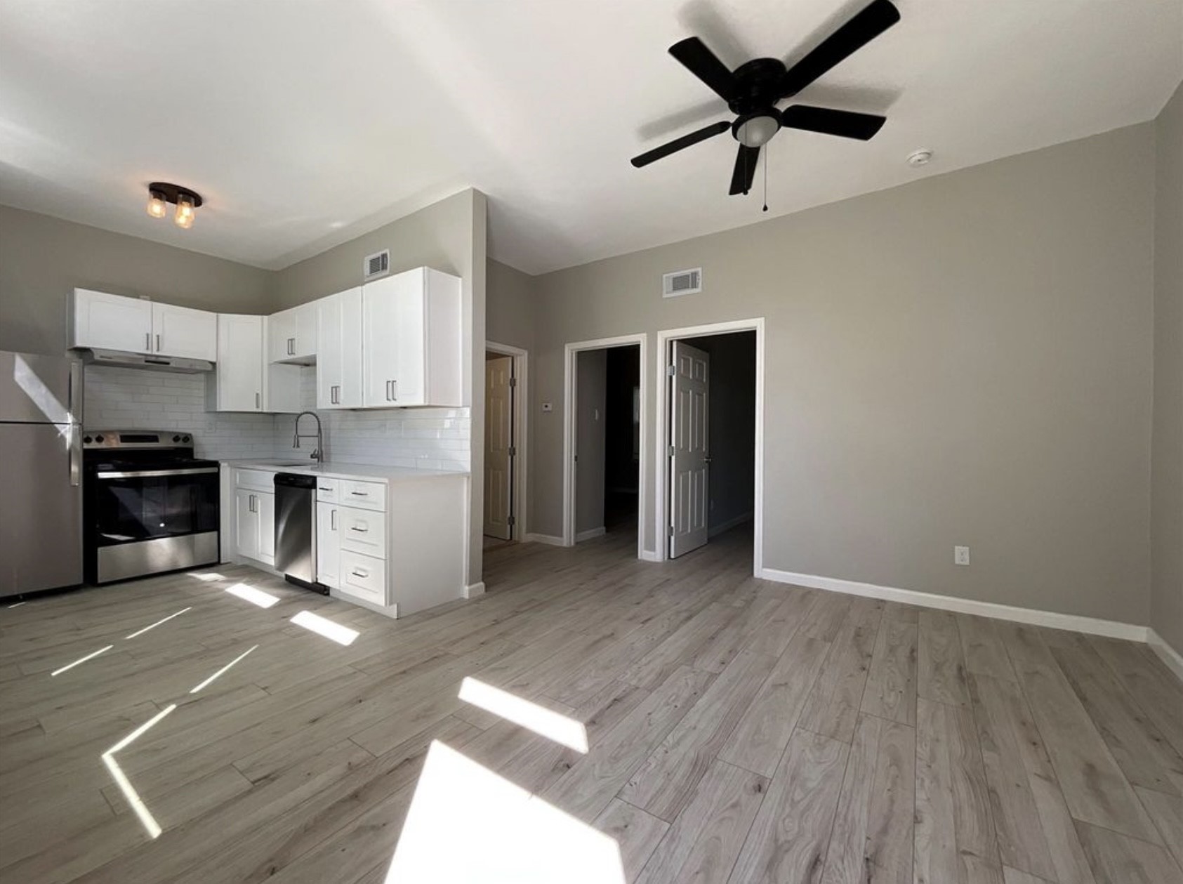 3403 Yupon Street Houston, TX 77006 - Photo 9 of 29 a view of kitchen with cabinets and wooden floor