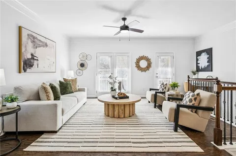a bathroom with a sink a toilet and a window