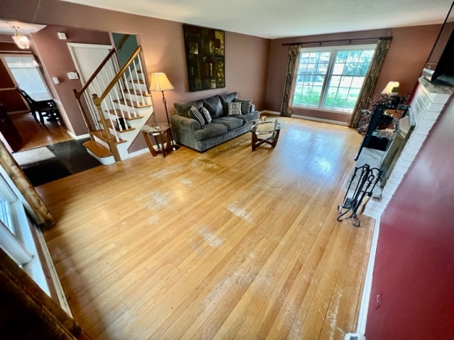 1243 Hillview Road Homewood, IL 60430 - Photo 4 of 23 a living room with furniture a flat screen tv and a window