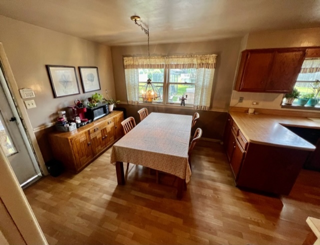 1243 Hillview Road Homewood, IL 60430 - Photo 7 of 23 a living room with furniture window and wooden floor
