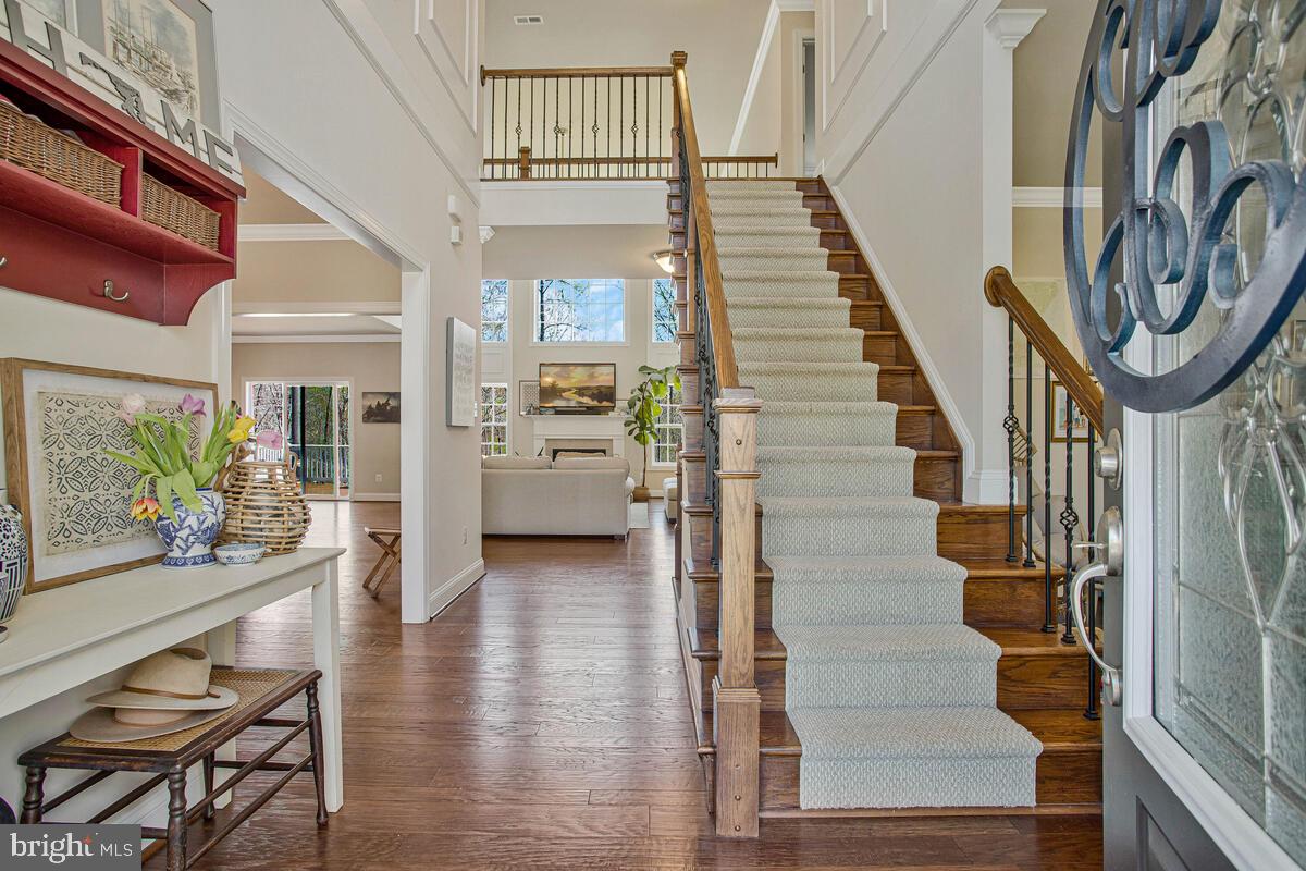 54 Simmons Ridge Road Prince Frederick, MD 20678 - Photo 5 of 55 a view of entryway and hall with wooden floor