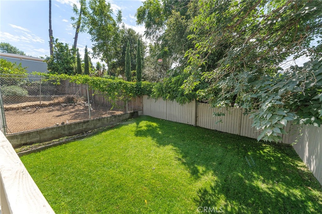 2628 Crestmoore Place Los Angeles, CA 90065 - Photo 12 of 14 a view of a backyard with large trees
