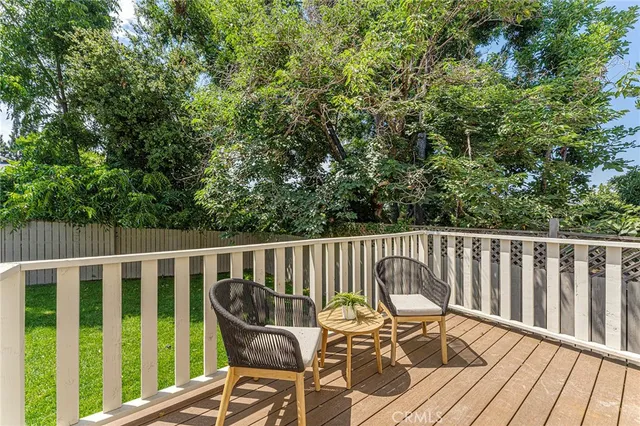 a view of a chair in wooden deck