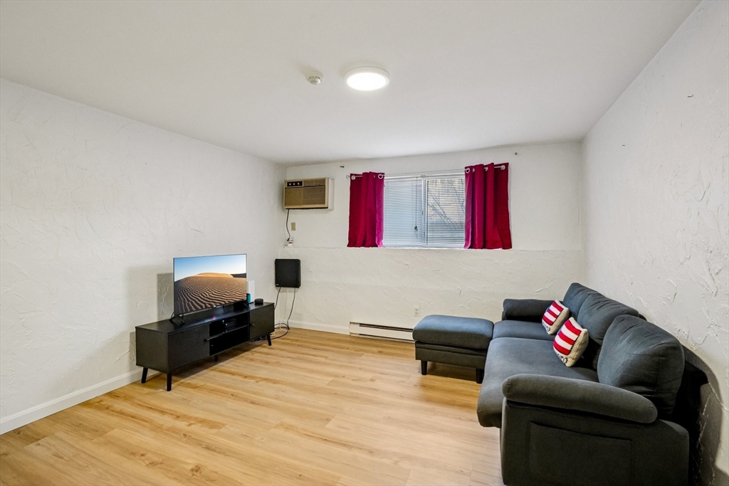 a living room with furniture and a couch