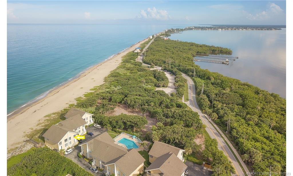 245 Northeast MacArthur Boulevard, Unit 5 Stuart, FL 34996 - Photo 3 of 38 a view of balcony with garden