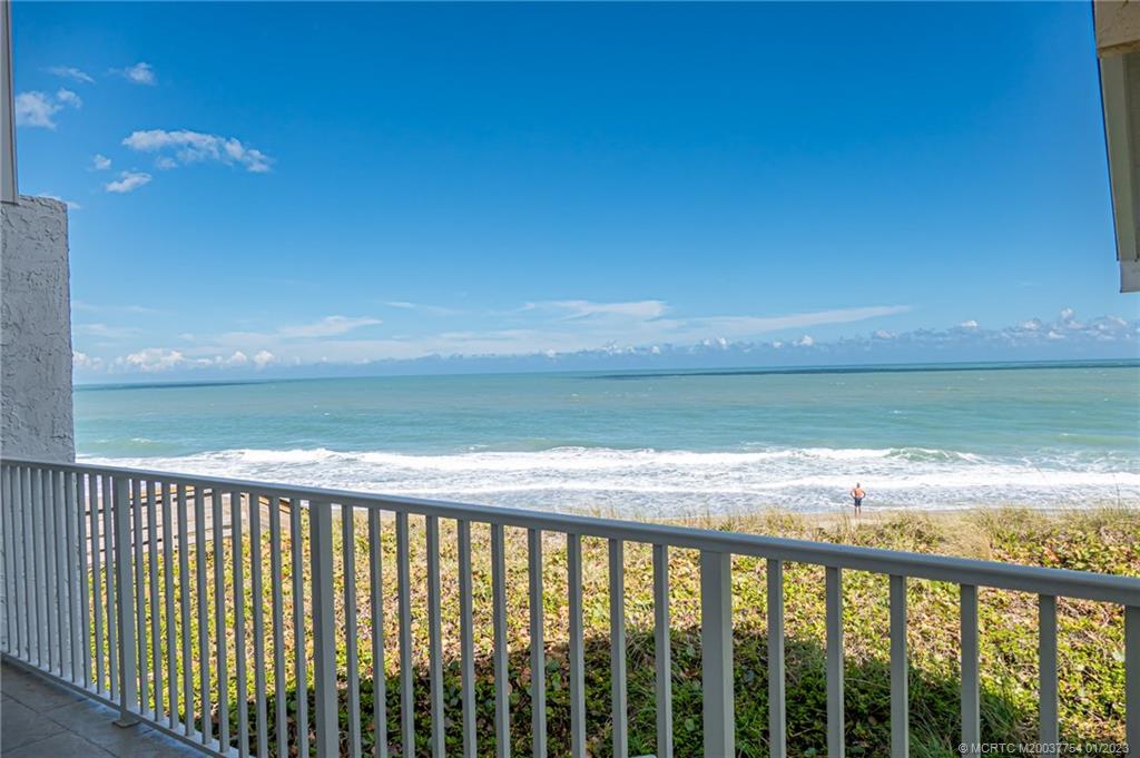 245 Northeast MacArthur Boulevard, Unit 5 Stuart, FL 34996 - Photo 8 of 38 a view of outside space and a lake view