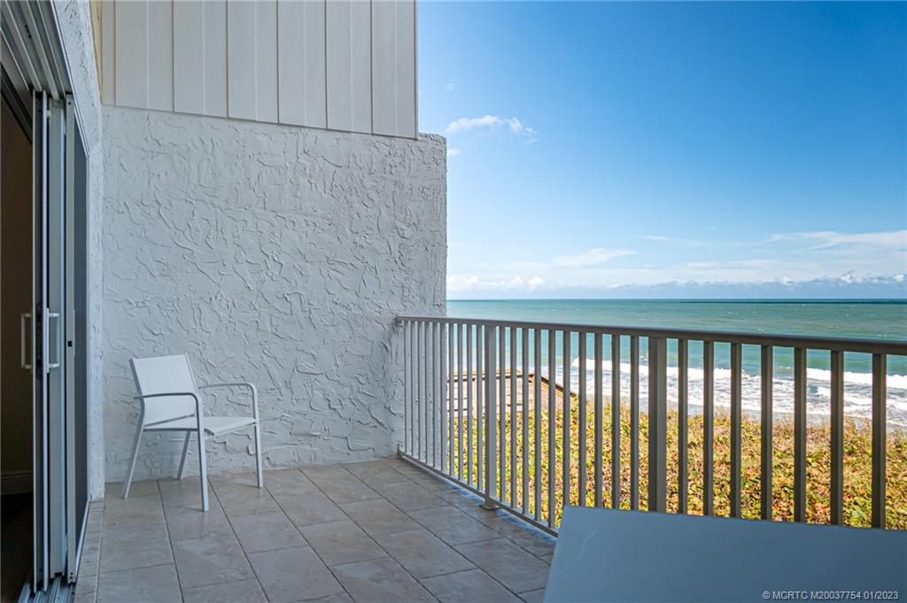 245 Northeast MacArthur Boulevard, Unit 5 Stuart, FL 34996 - Photo 10 of 38 a view of a room with racks on the wall
