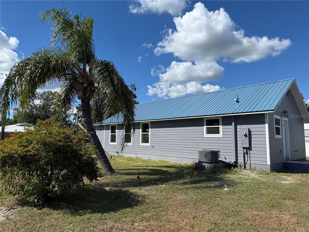 103 South Roger Avenue Arcadia, FL 34266 - Photo 3 of 22 a view of a house with a yard