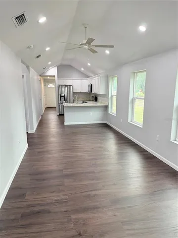 a view of kitchen and windows