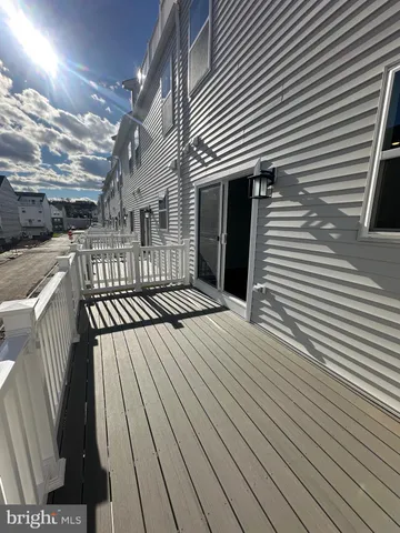a view of balcony with furniture