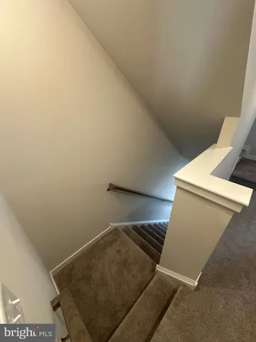 a view of hallway with shower