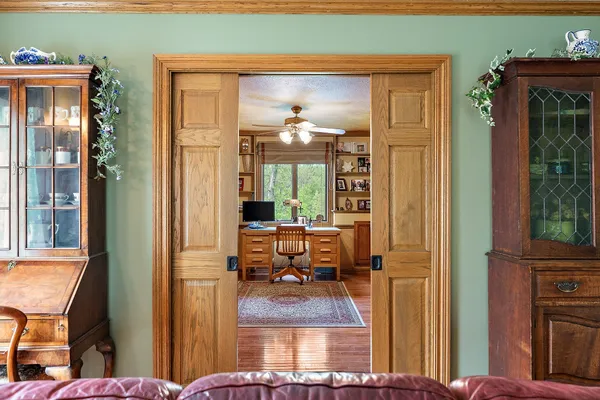 a kitchen with stainless steel appliances granite countertop a stove refrigerator and cabinets