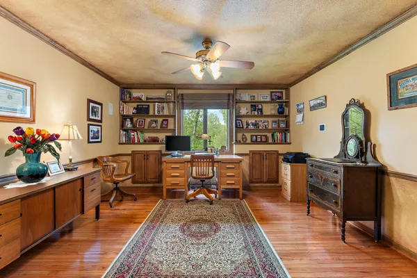 a kitchen with stainless steel appliances granite countertop a stove and a microwave