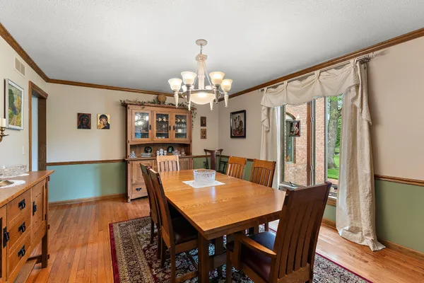 a kitchen with stainless steel appliances granite countertop a stove refrigerator and a microwave