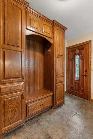 a room with furniture and pool table