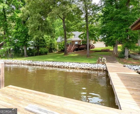 a view of a lake view with a bench
