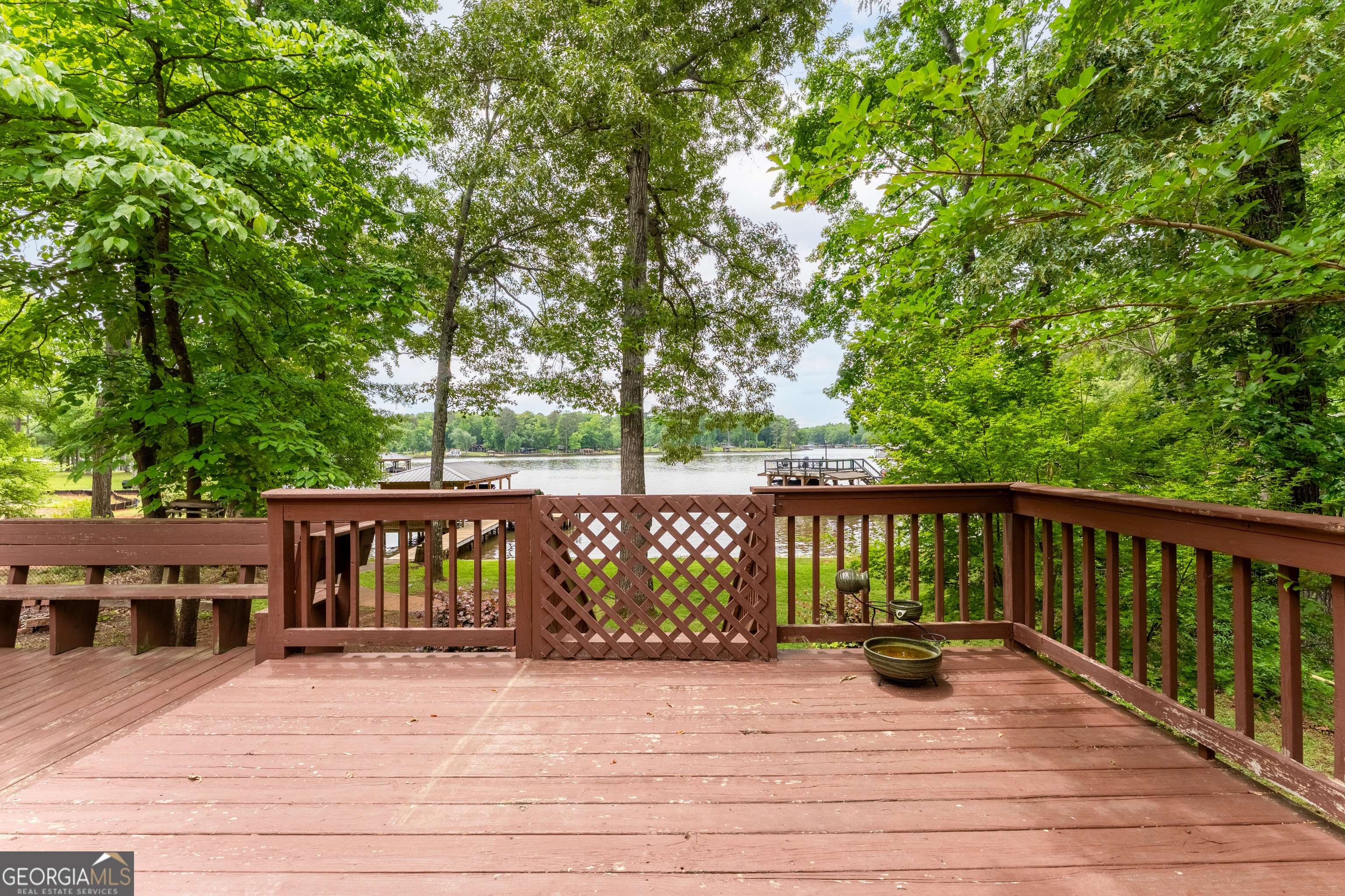142 Tanglewood Road Southwest Eatonton, GA 31024 - Photo 29 of 50 a view of outdoor space with deck and tree