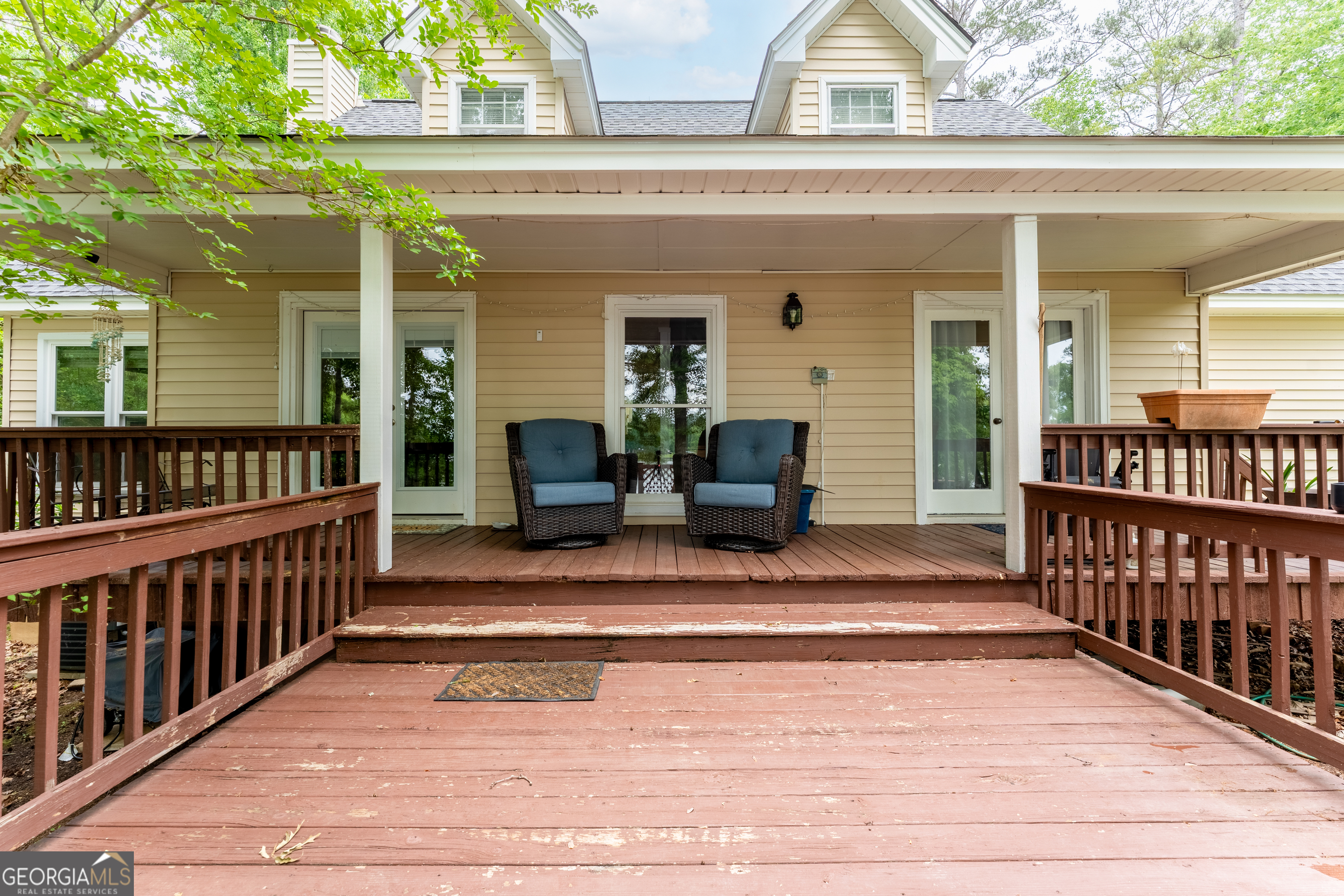 142 Tanglewood Road Southwest Eatonton, GA 31024 - Photo 30 of 50 a view of front door and deck with patio