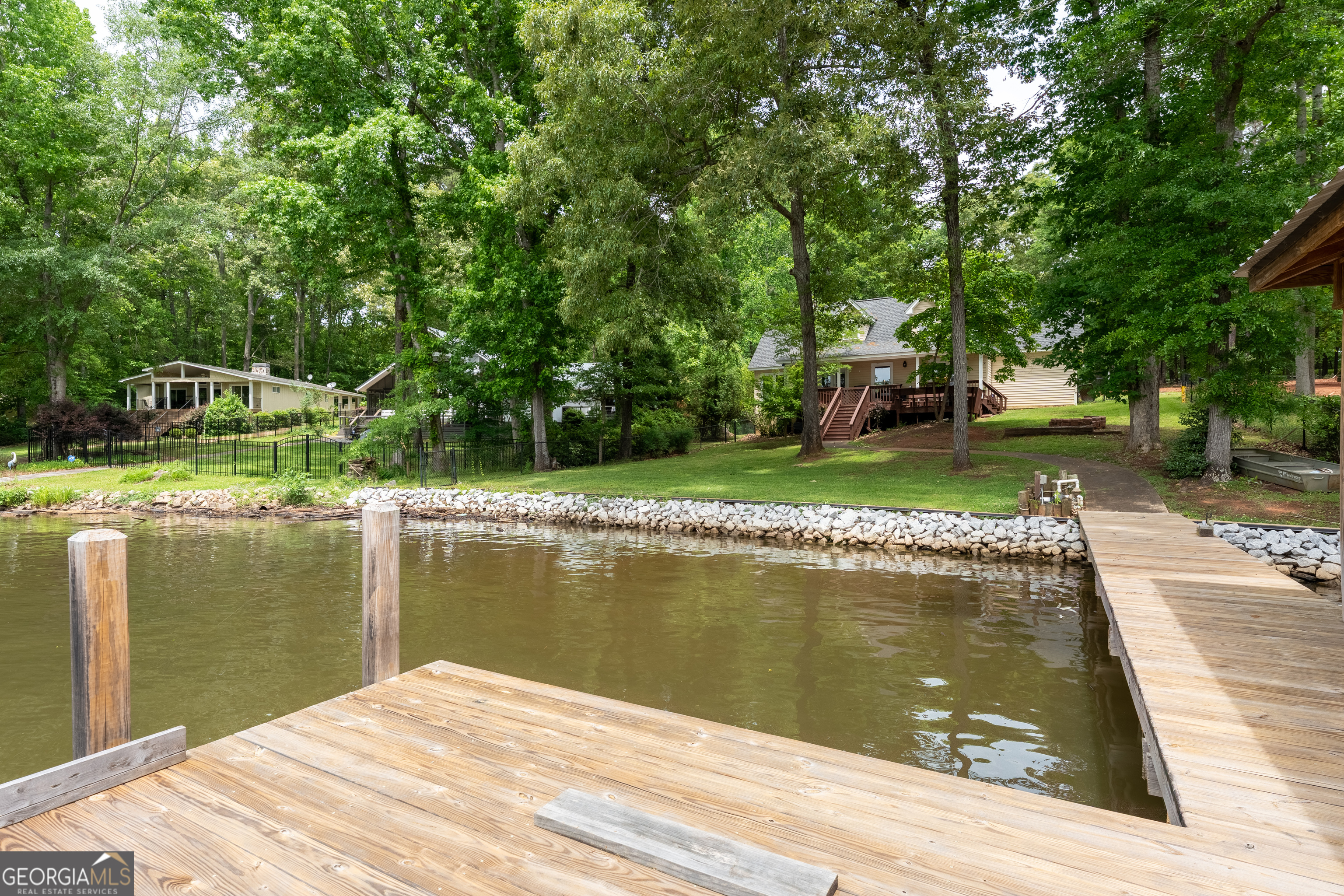 142 Tanglewood Road Southwest Eatonton, GA 31024 - Photo 37 of 50 a view of a lake view
