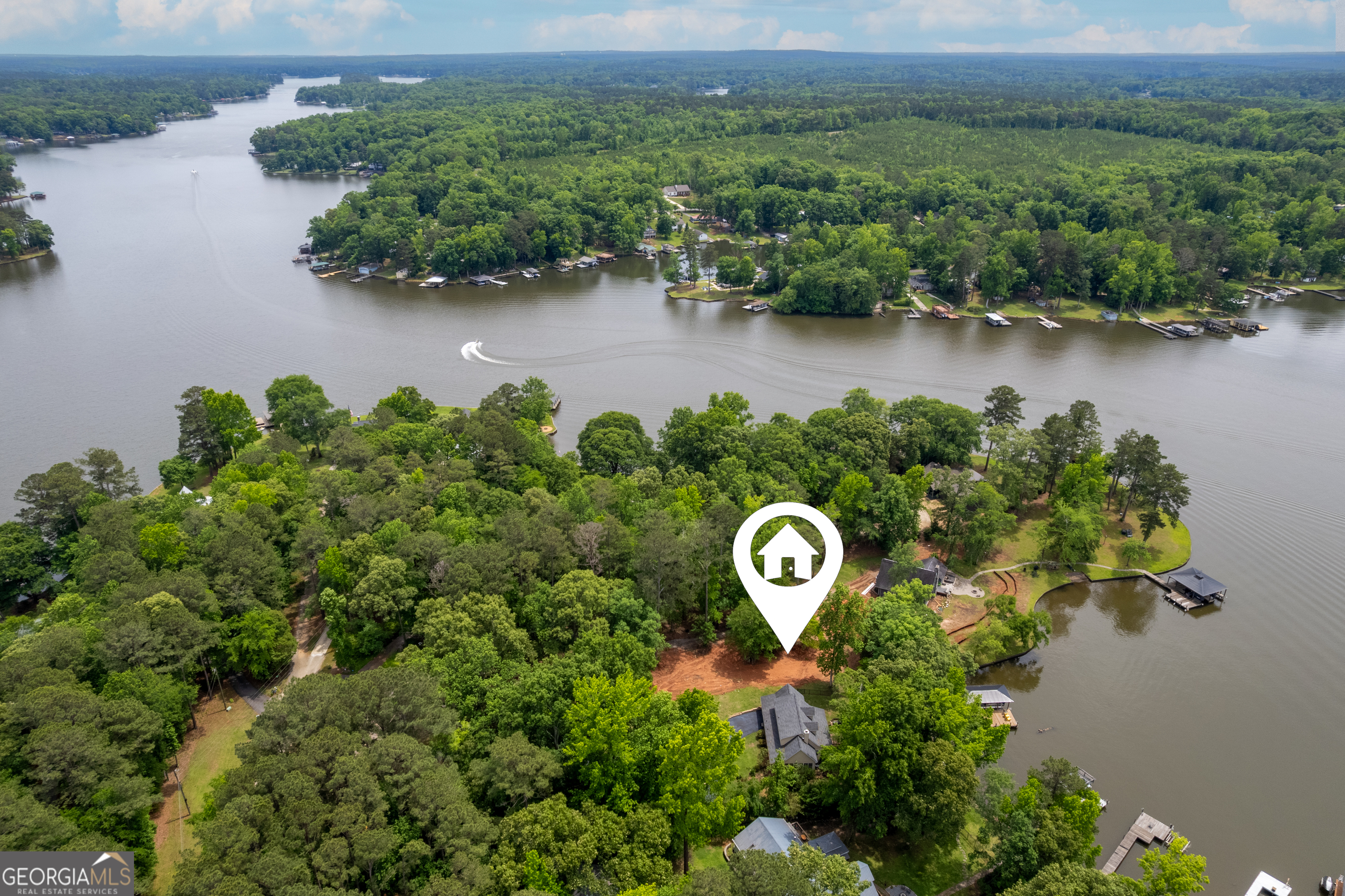 142 Tanglewood Road Southwest Eatonton, GA 31024 - Photo 44 of 50 an aerial view of a house with outdoor space and lake view