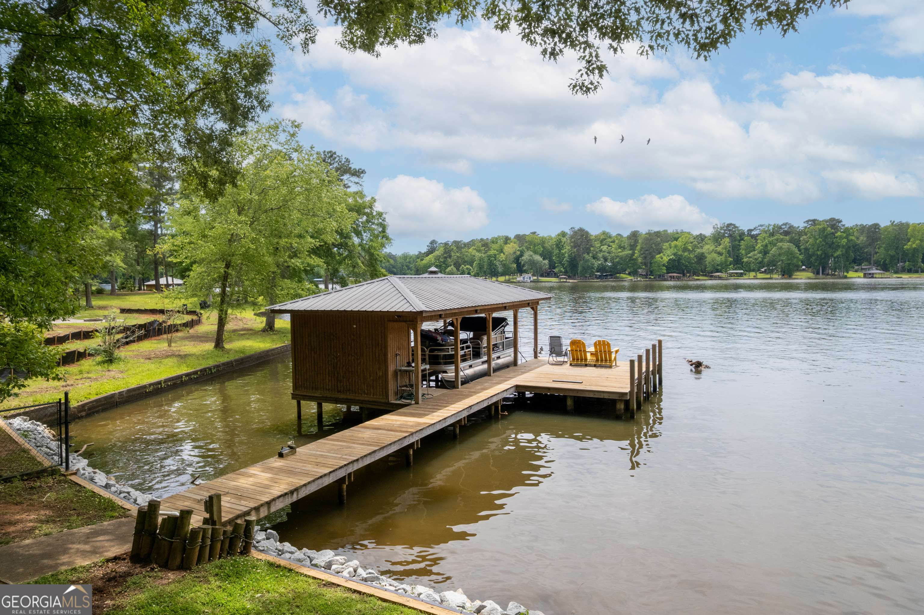 142 Tanglewood Road Southwest Eatonton, GA 31024 - Photo 48 of 50 a view of boat floating on water
