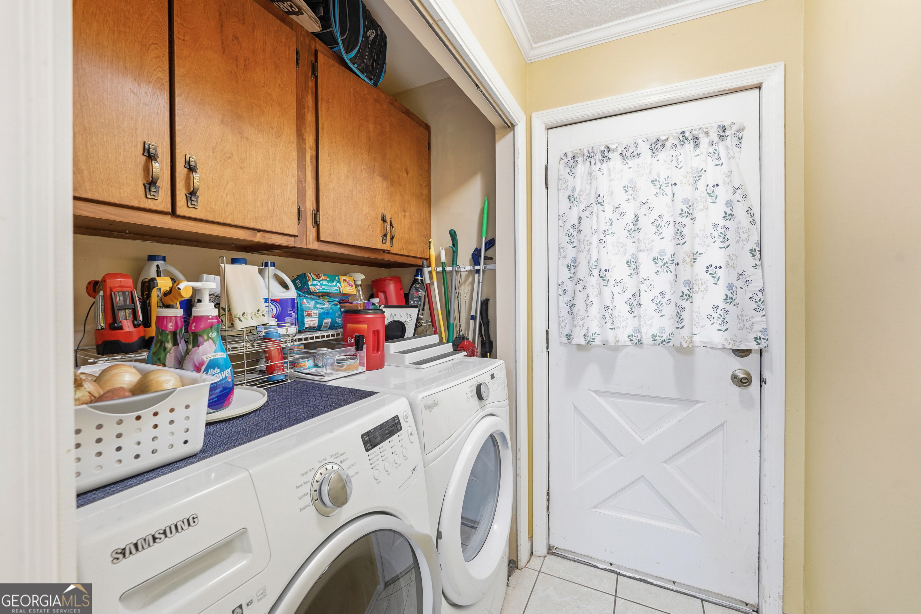 142 Tanglewood Road Southwest Eatonton, GA 31024 - Photo 10 of 50 a utility room with dryer and washer