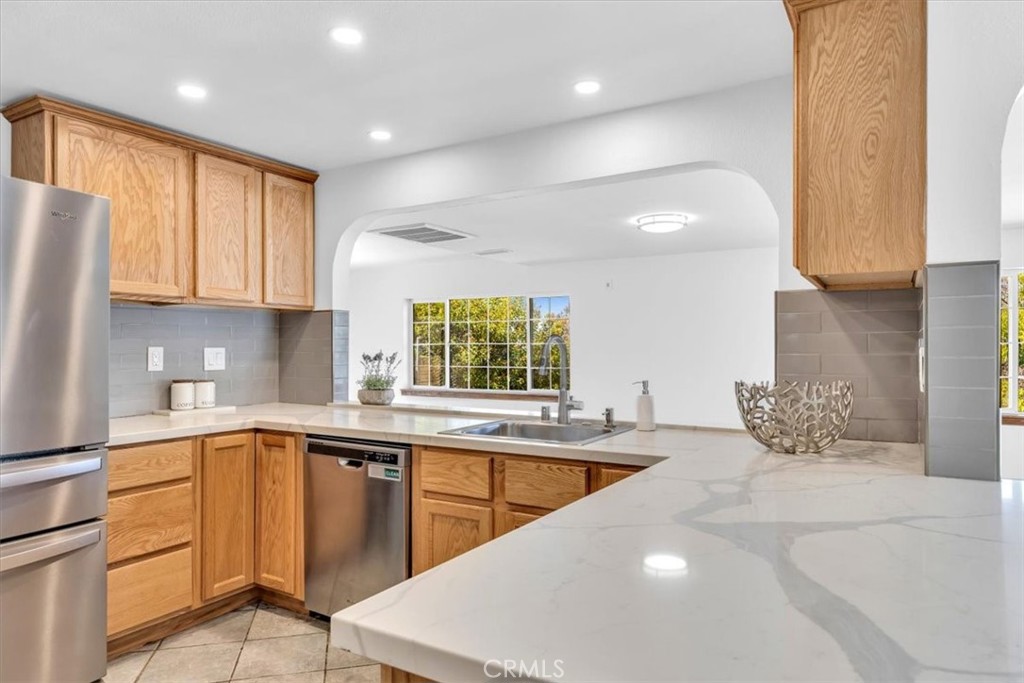3315 Hawkwood Road Diamond Bar, CA 91765 - Photo 10 of 64 Kitchen with custom backsplash and recessed lights