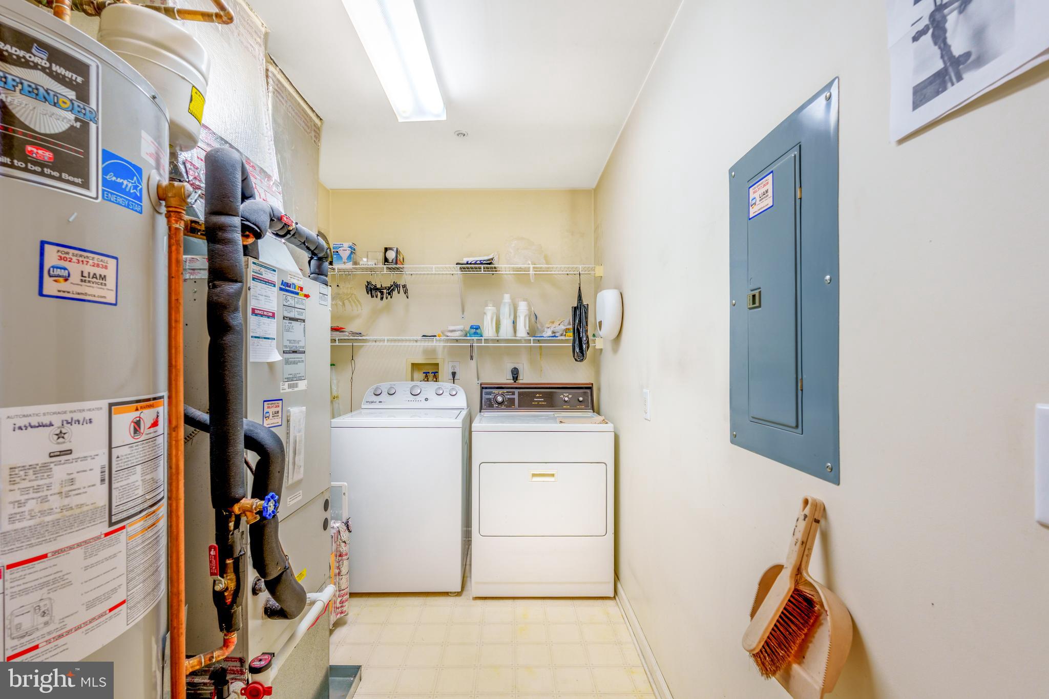 1305 Independence Way Newark, DE 19713 - Photo 17 of 25 a view of walk in closet with clothes and shoes