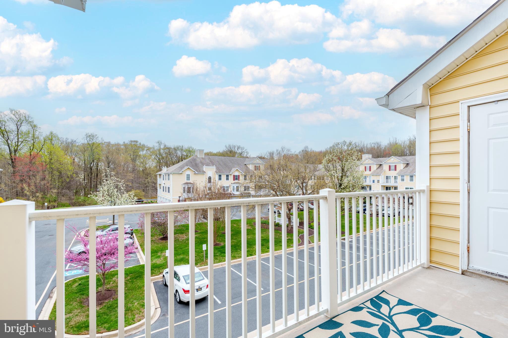1305 Independence Way Newark, DE 19713 - Photo 19 of 25 a view of a chairs and table in the balcony