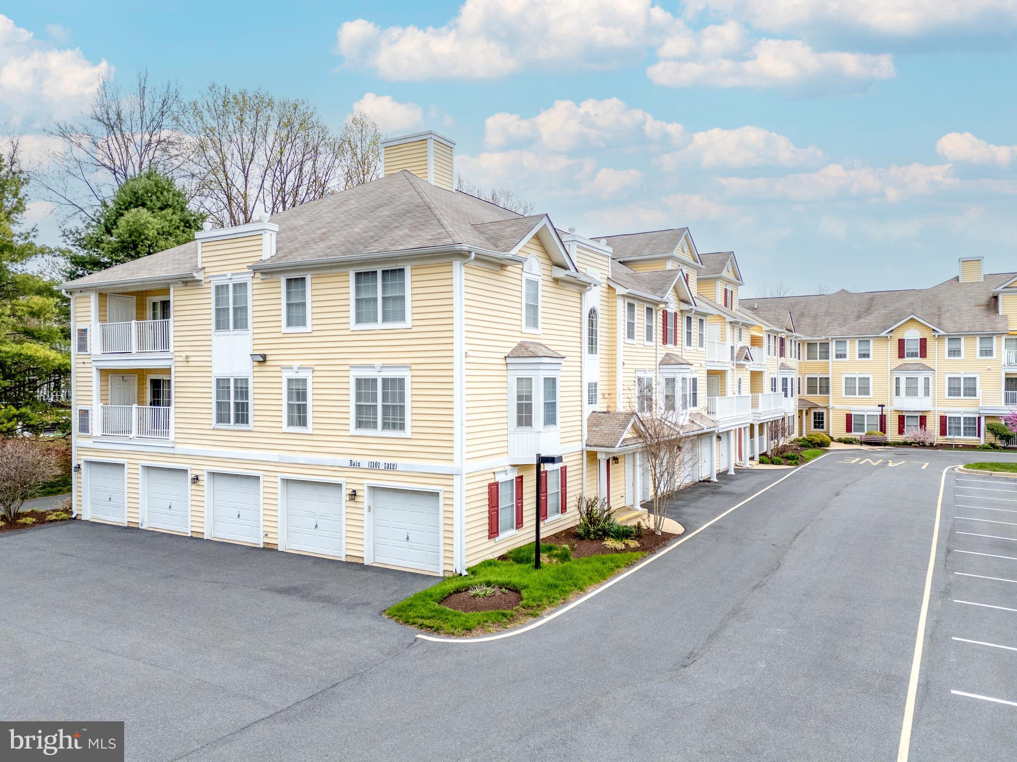 1305 Independence Way Newark, DE 19713 - Photo 23 of 25 a front view of a house with a yard and dinning table