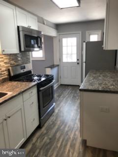 145 West Garrison Road Brookhaven, PA 19015 - Photo 16 of 33 Kitchen view to rear exit to deck