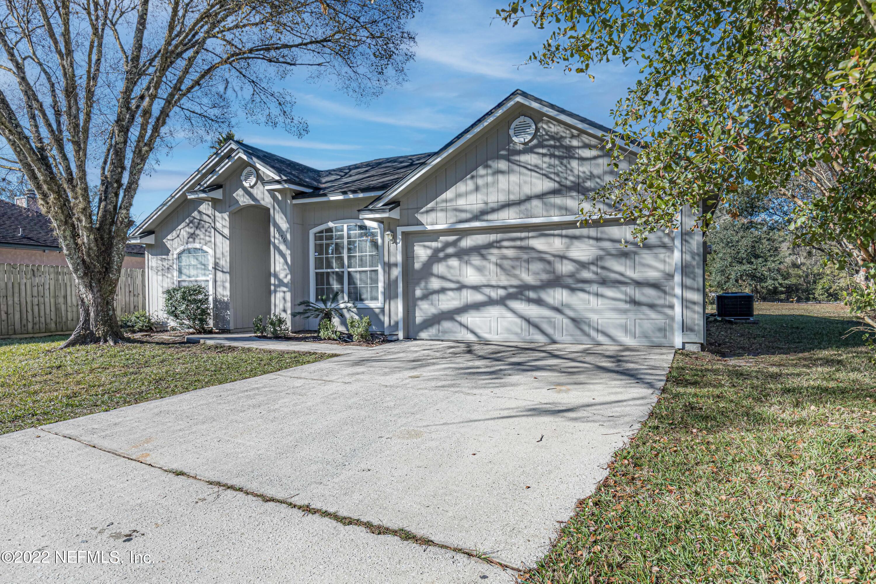 7696 Enderby Avenue East Jacksonville, FL 32244 - Photo 3 of 35 a view of a house with a yard