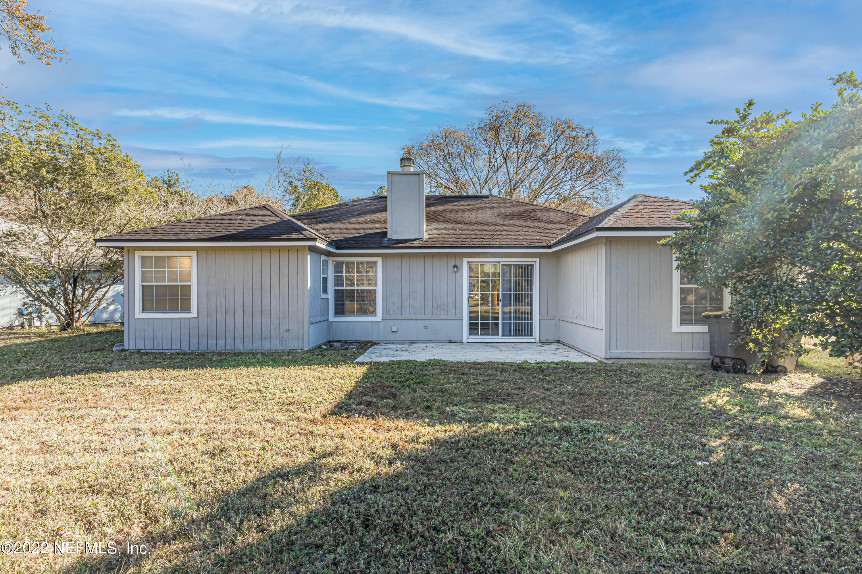 7696 Enderby Avenue East Jacksonville, FL 32244 - Photo 31 of 35 a view of a house with a yard