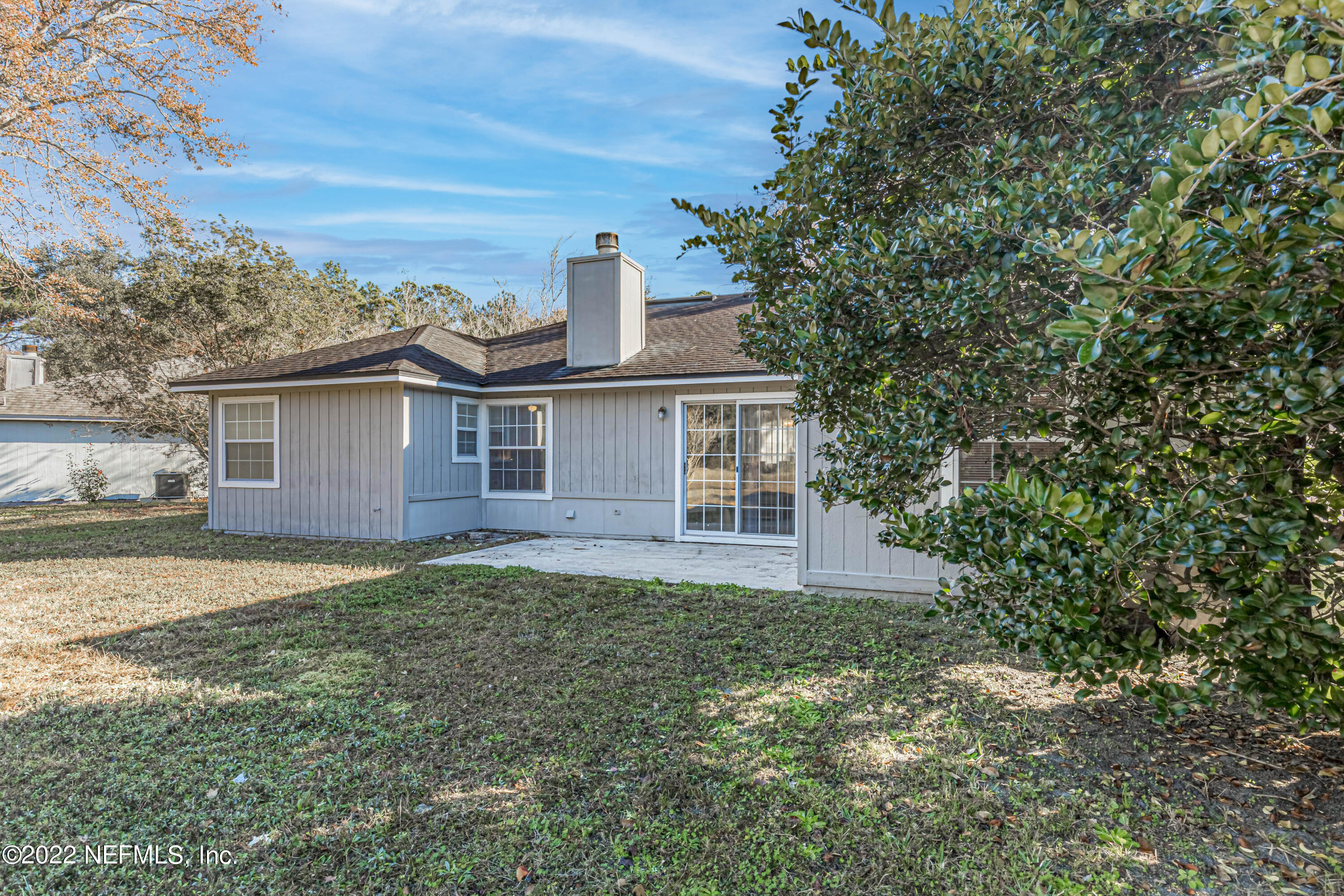 7696 Enderby Avenue East Jacksonville, FL 32244 - Photo 32 of 35 a view of a house with a yard