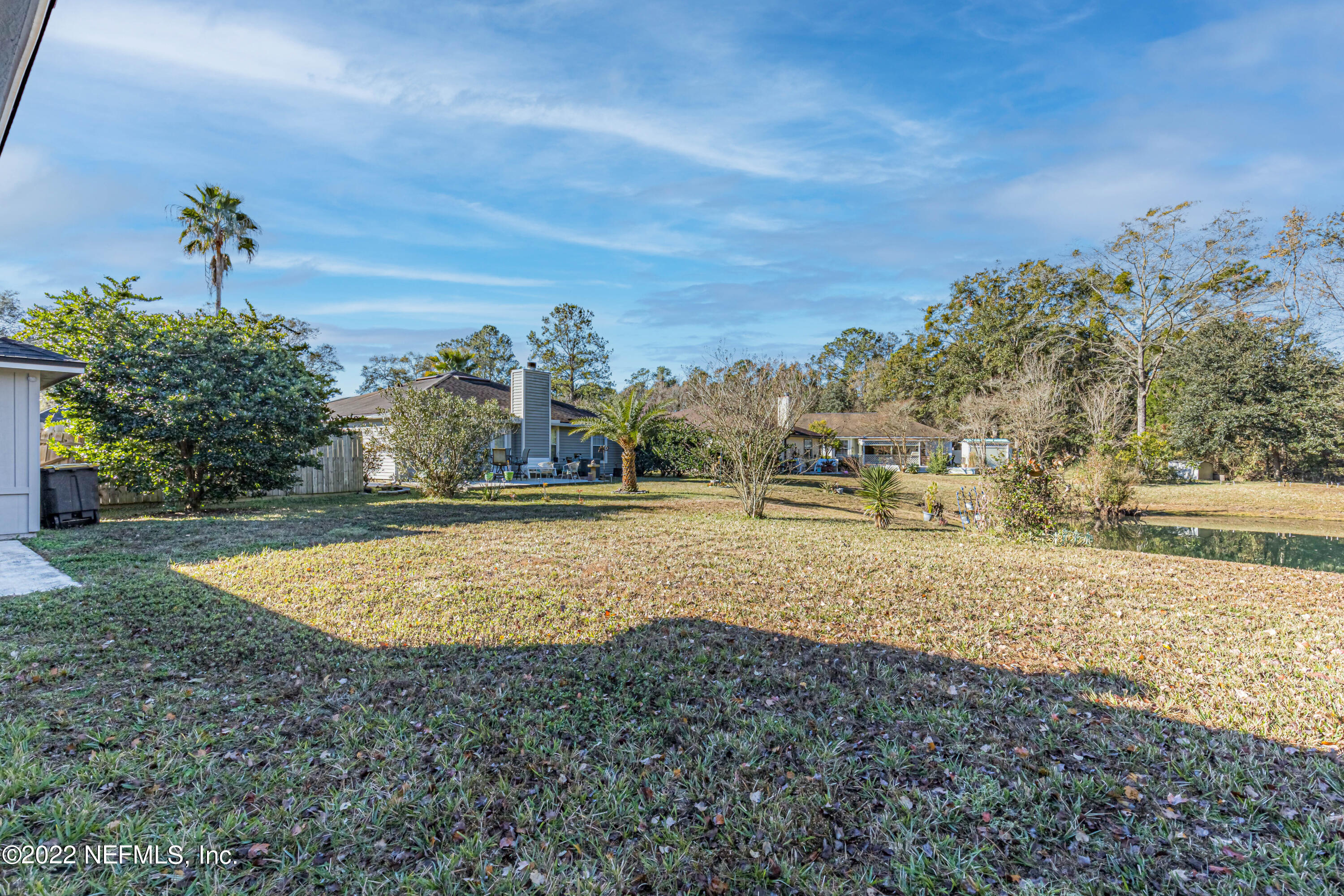 7696 Enderby Avenue East Jacksonville, FL 32244 - Photo 34 of 35 a view of a yard with swimming pool