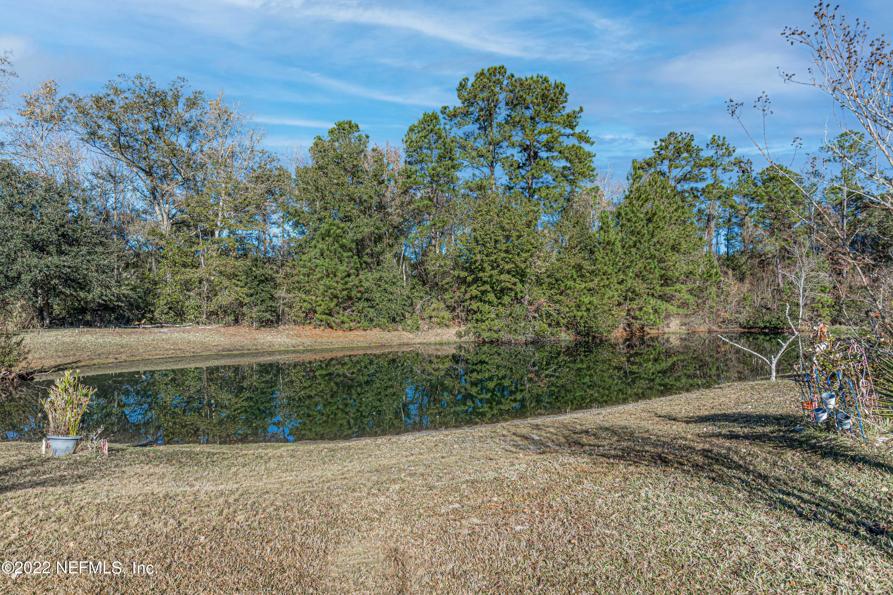 7696 Enderby Avenue East Jacksonville, FL 32244 - Photo 35 of 35 a view of a yard with a tree