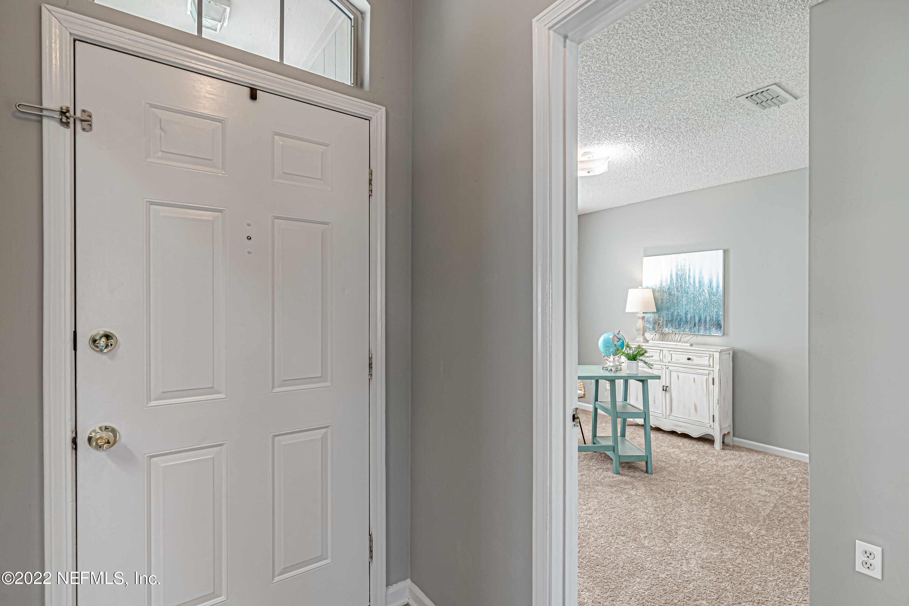 7696 Enderby Avenue East Jacksonville, FL 32244 - Photo 7 of 35 a room that has a window in it