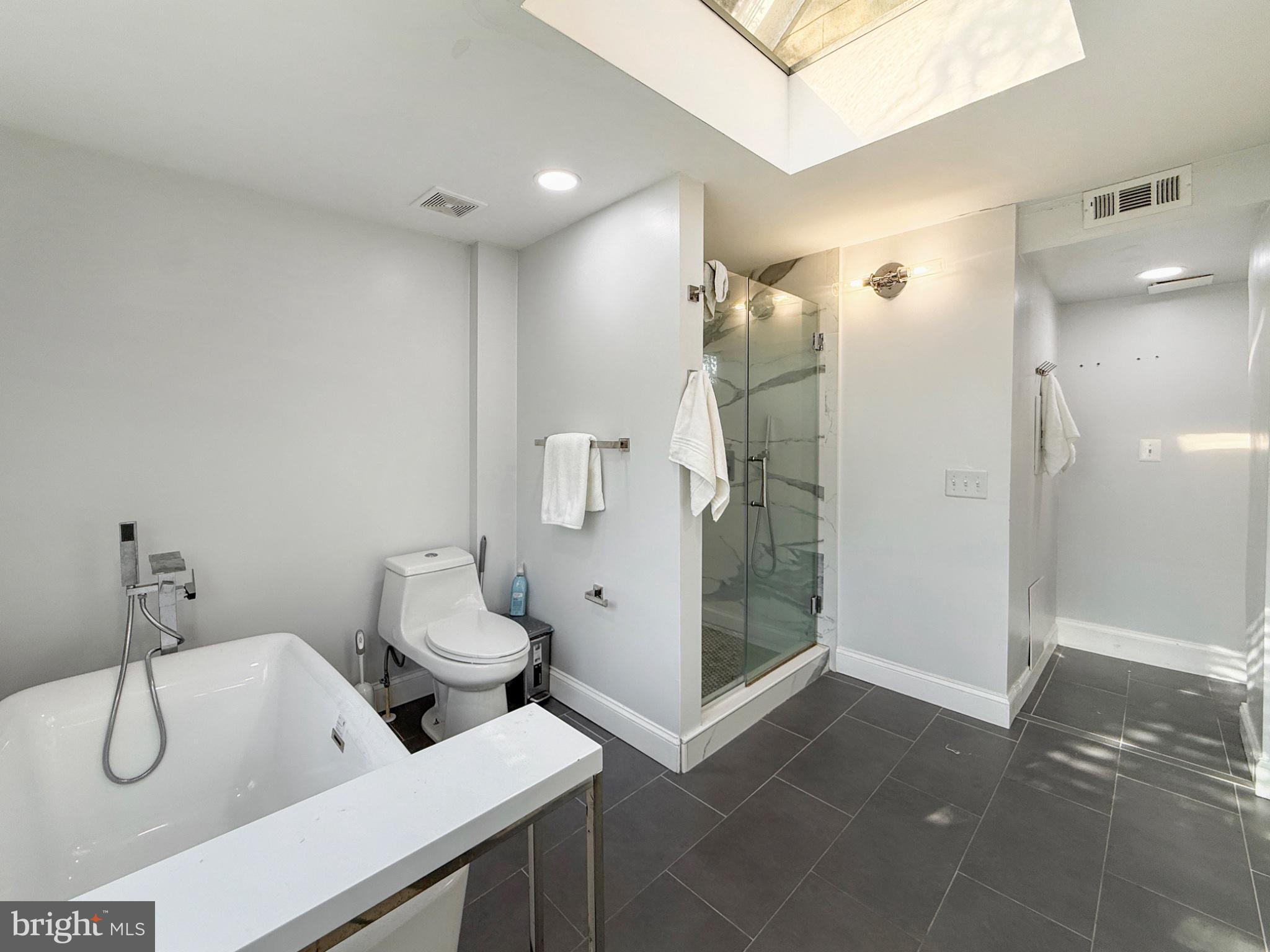 3216 18th Street Northeast Washington, DC 20018 - Photo 22 of 47 Modern bathroom with sleek design.